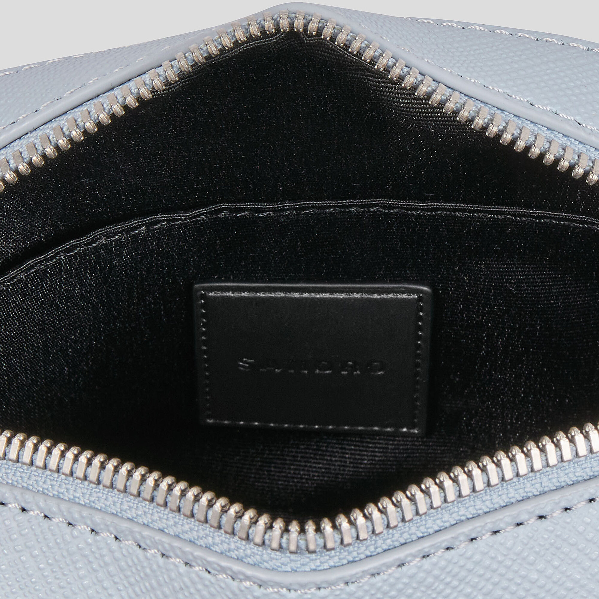 Bolso pequeño de cuero reconstituido