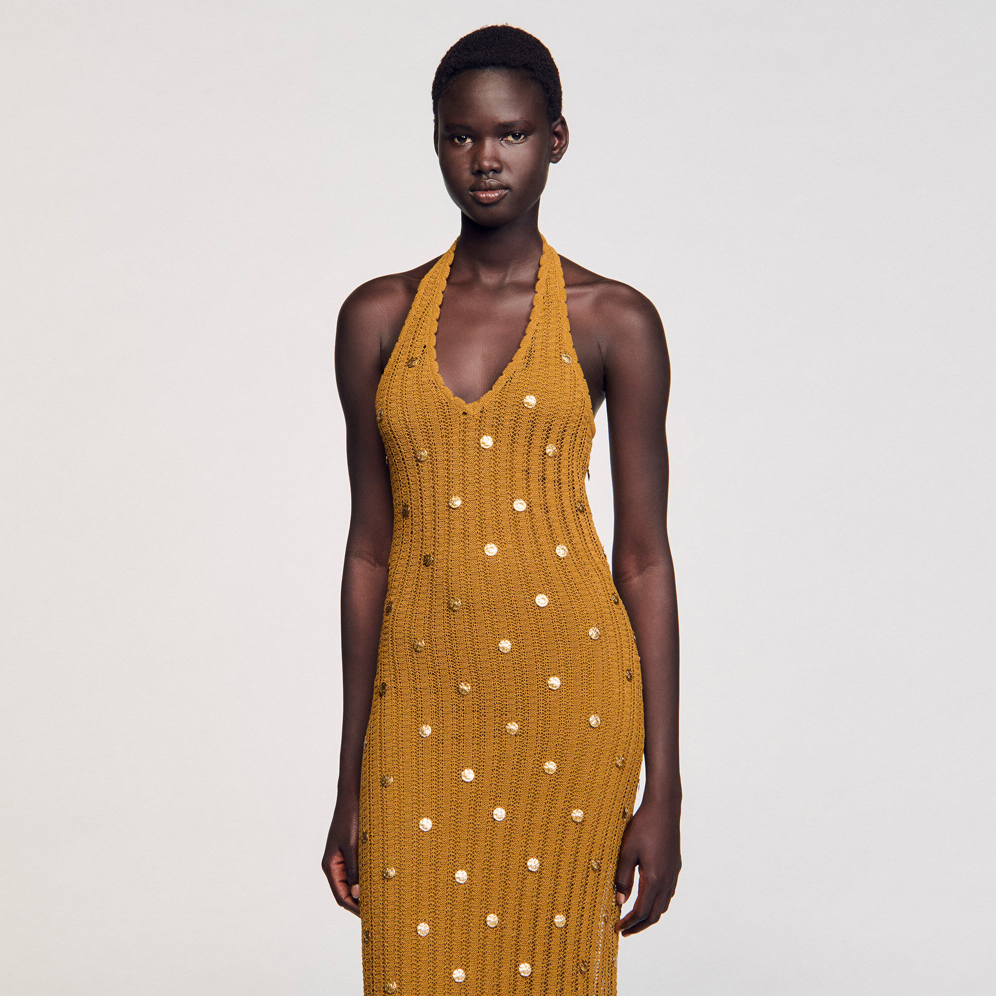 Vestido largo de punto con flecos
