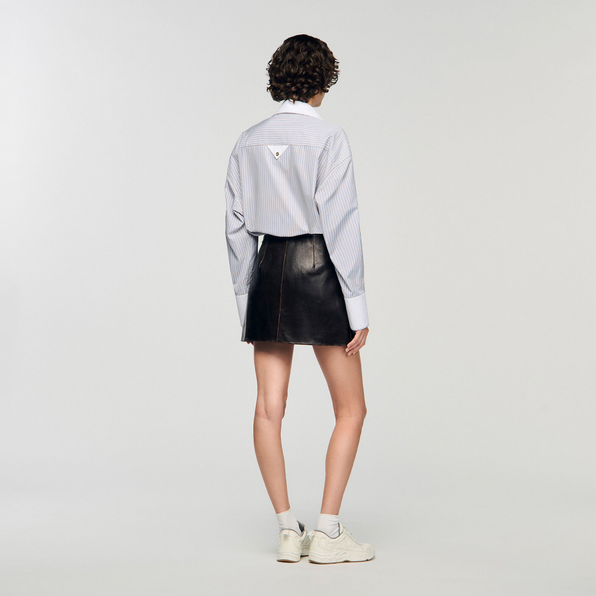 Falda corta de cuero envejecido - Mujer | Sandro