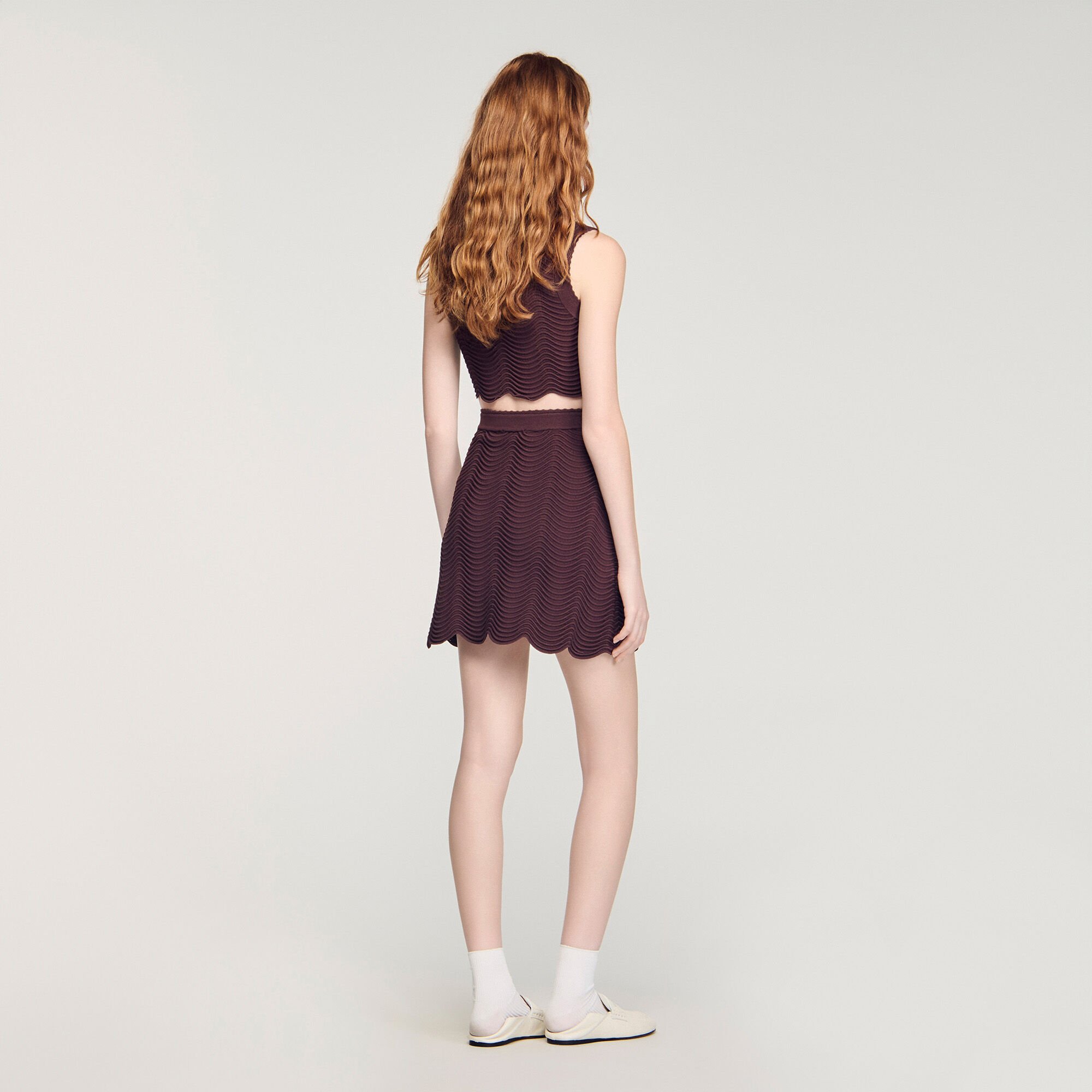 Falda corta de punto de fantas&iacute;a