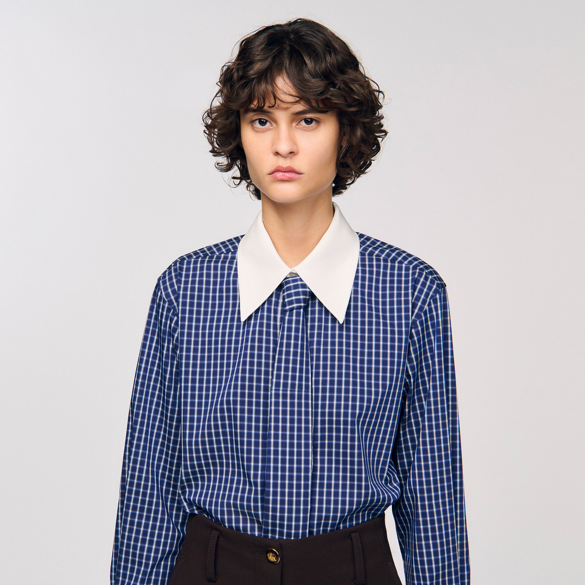 Camisa a cuadros y corbata