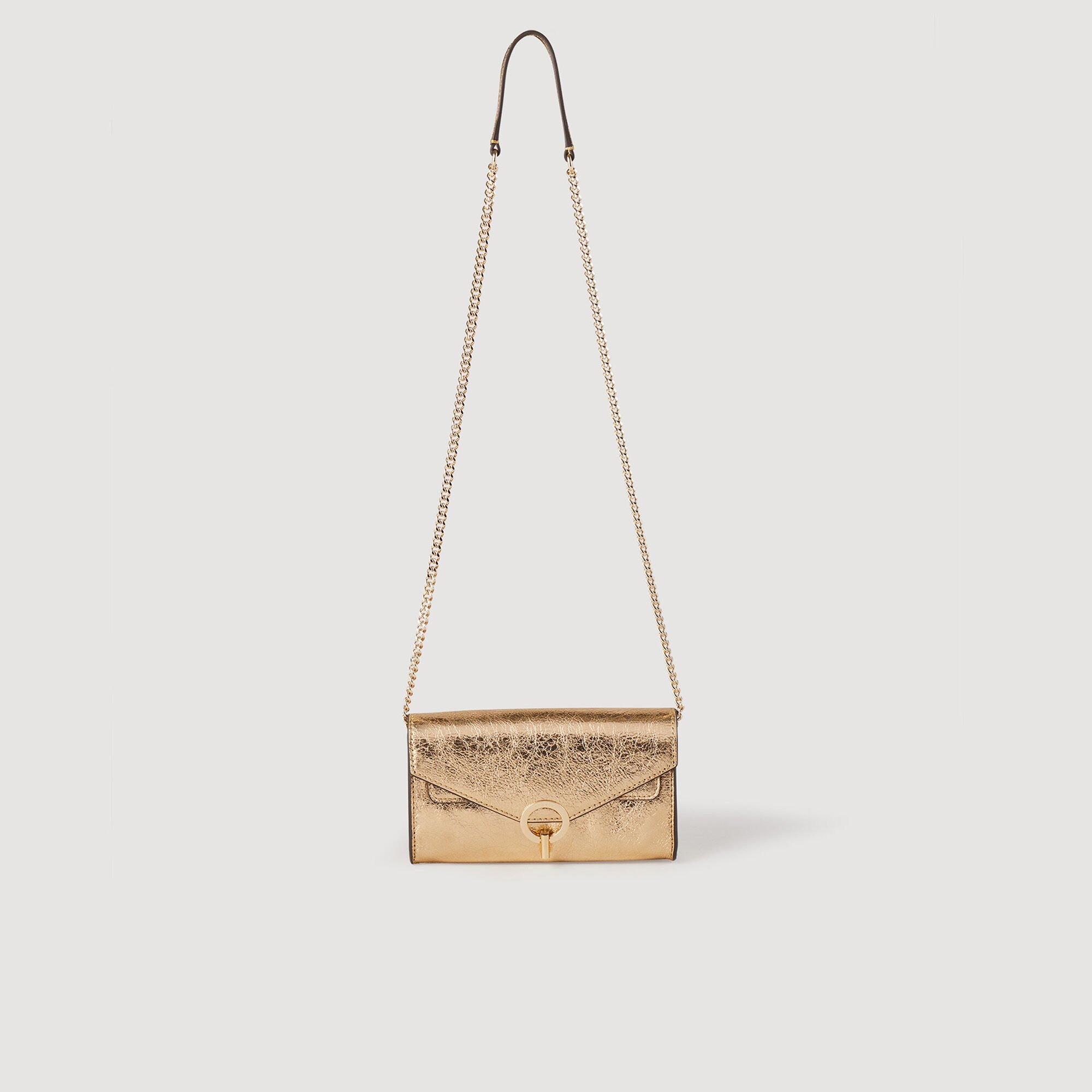 Bolso pochette de piel dorada