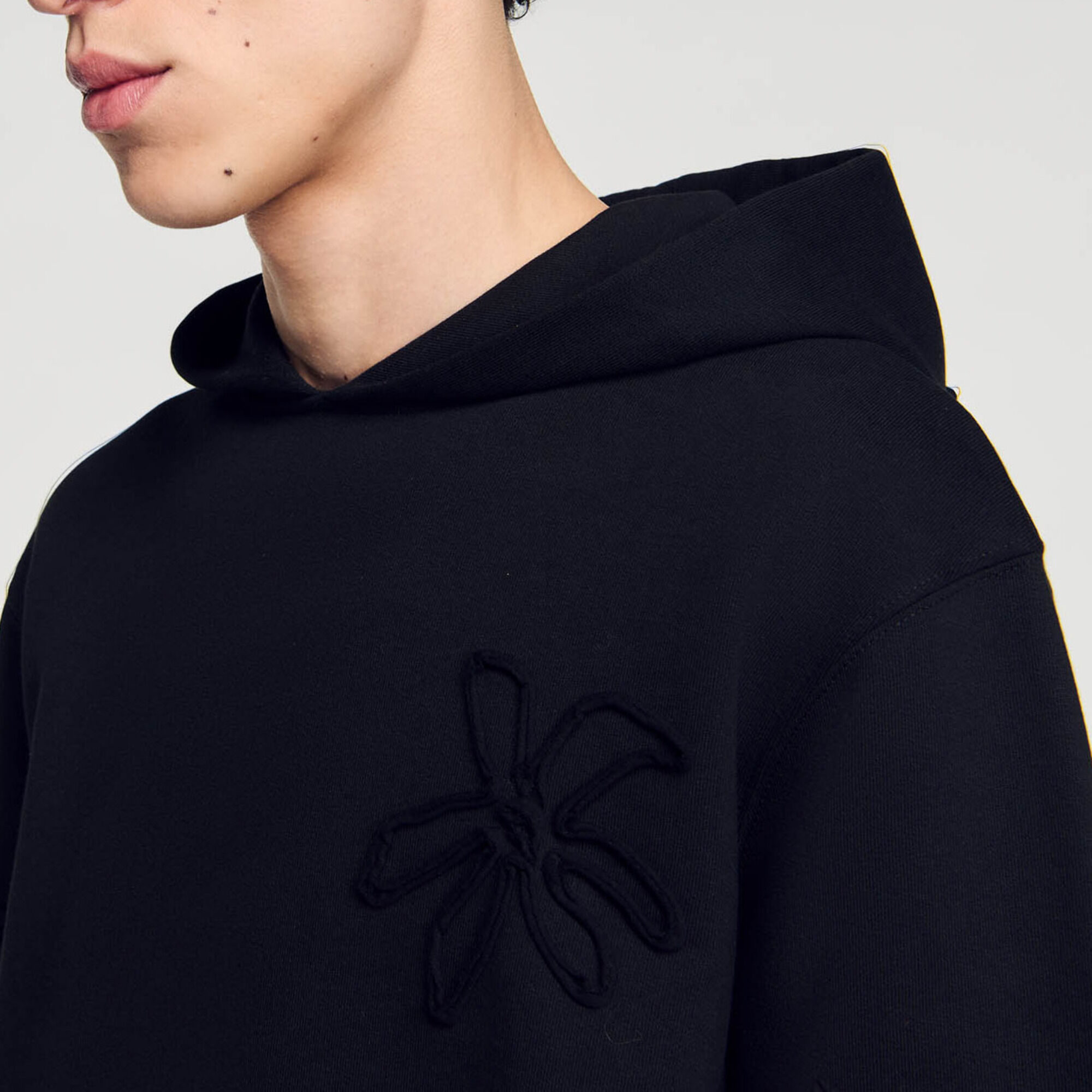 Sudadera con capucha adornada con flores - Hombre | Sandro