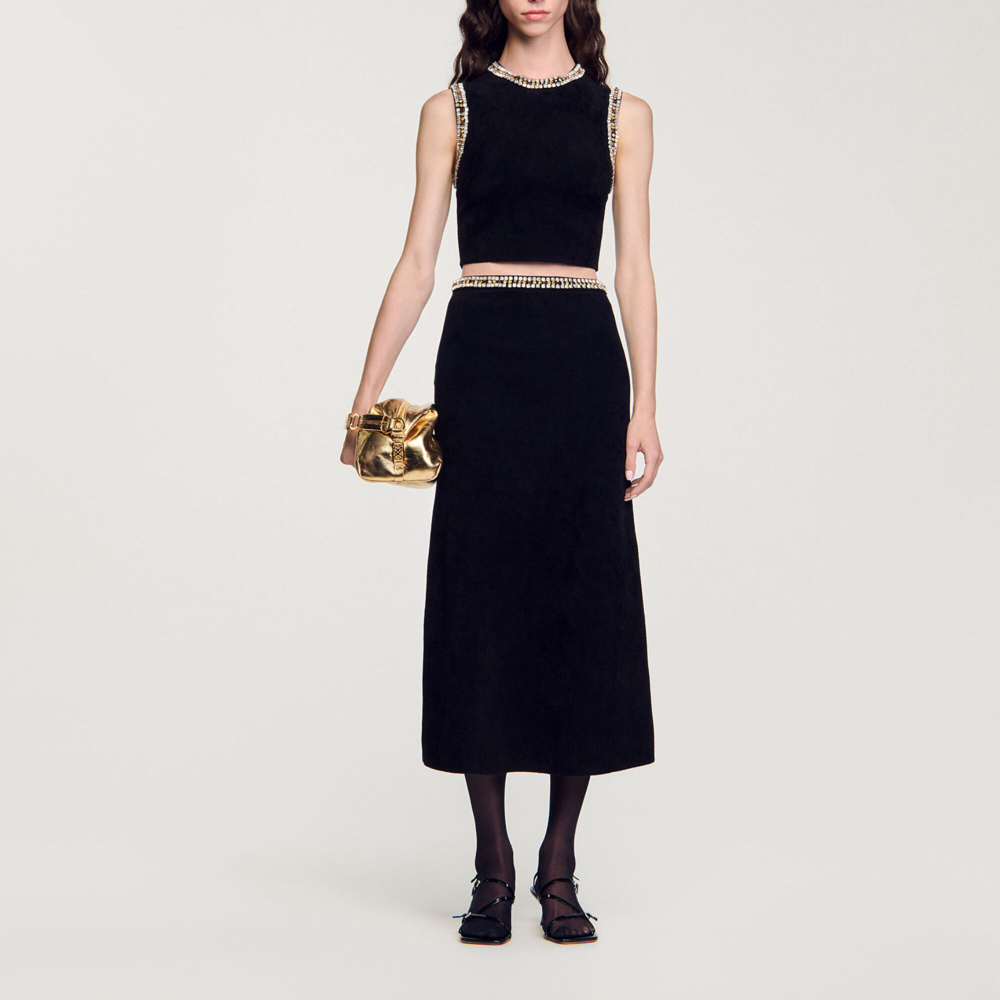 Top de punto con cuello joya