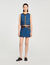 Top de denim y cuero