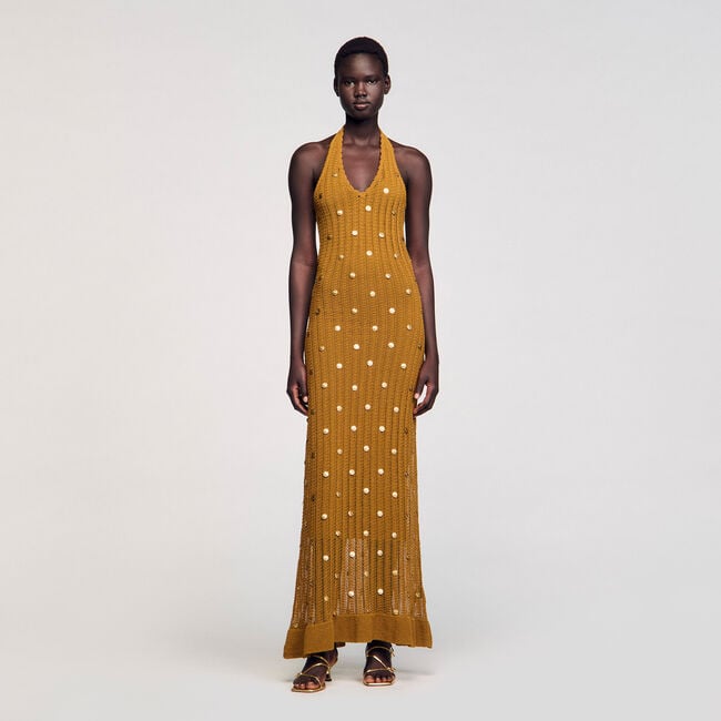 Vestido largo de punto con flecos