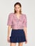 Camisa a rayas con volantes