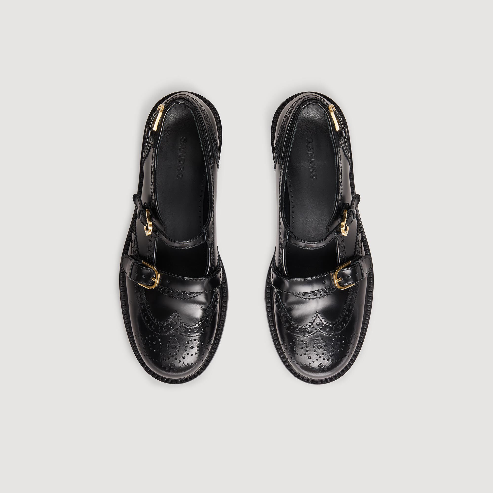 Zapatos derby abiertos con hebillas