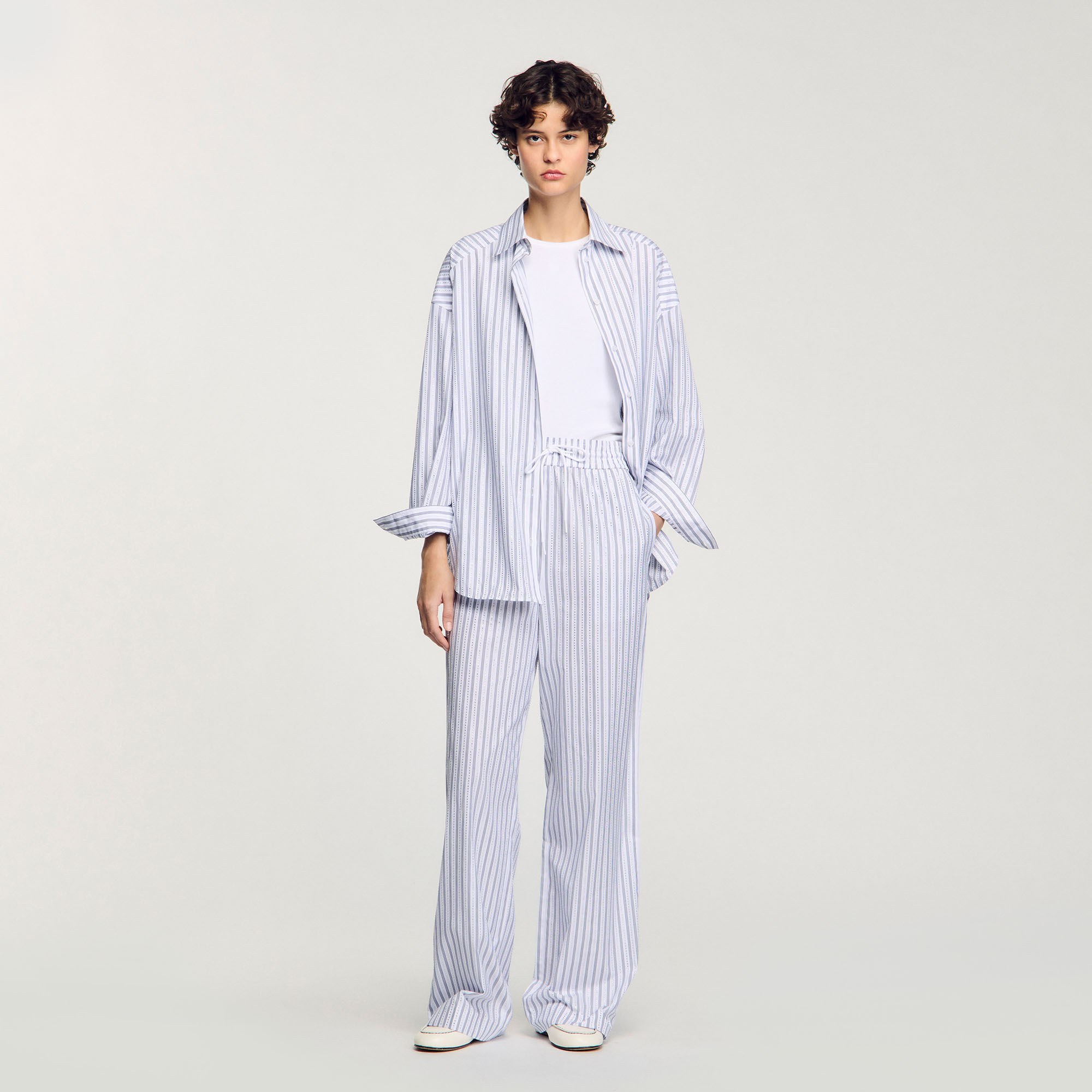 Pantalón a rayas con brillantes