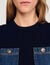 Top de punto y denim