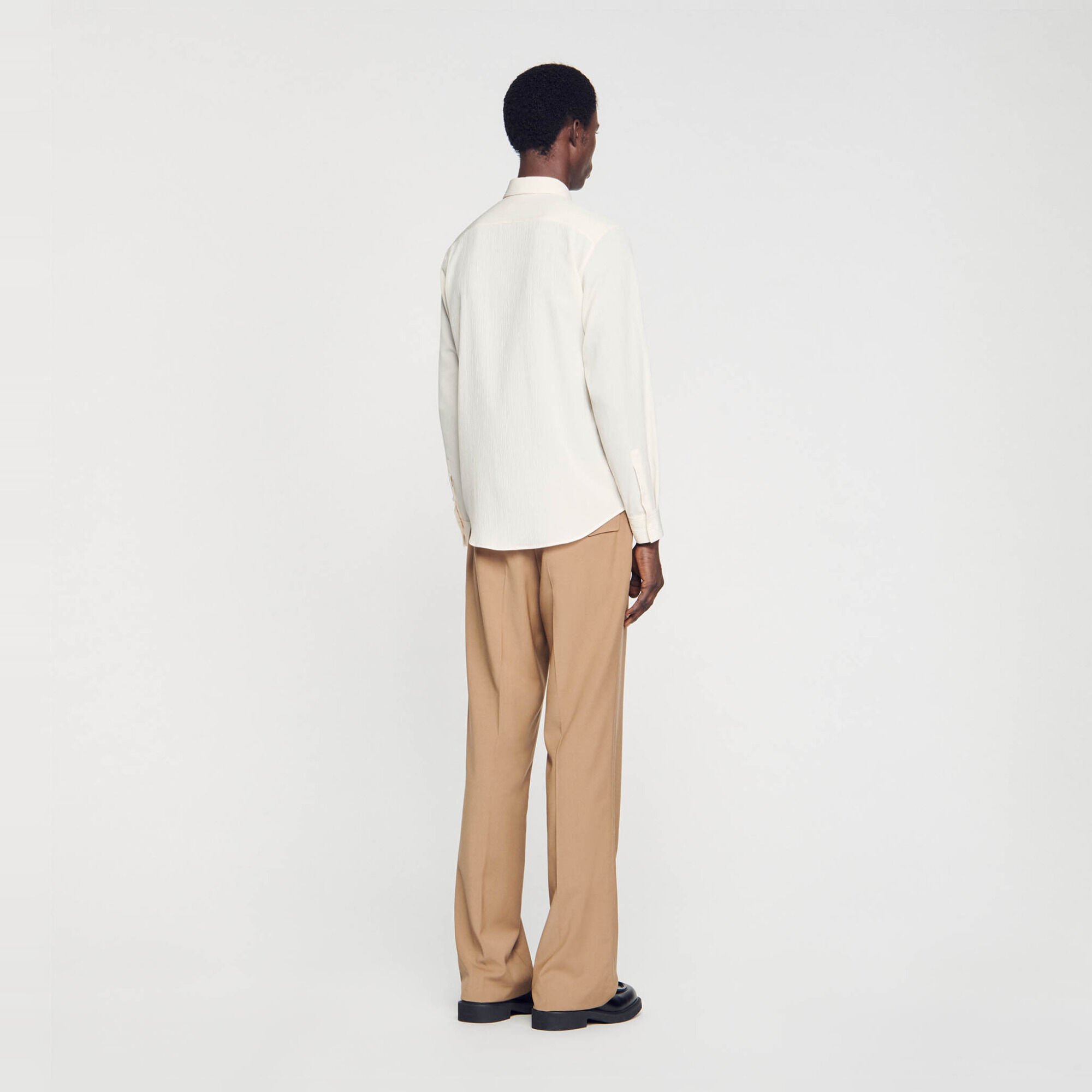 Camisa fluida plisada