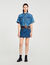 Falda corta de denim y cuero