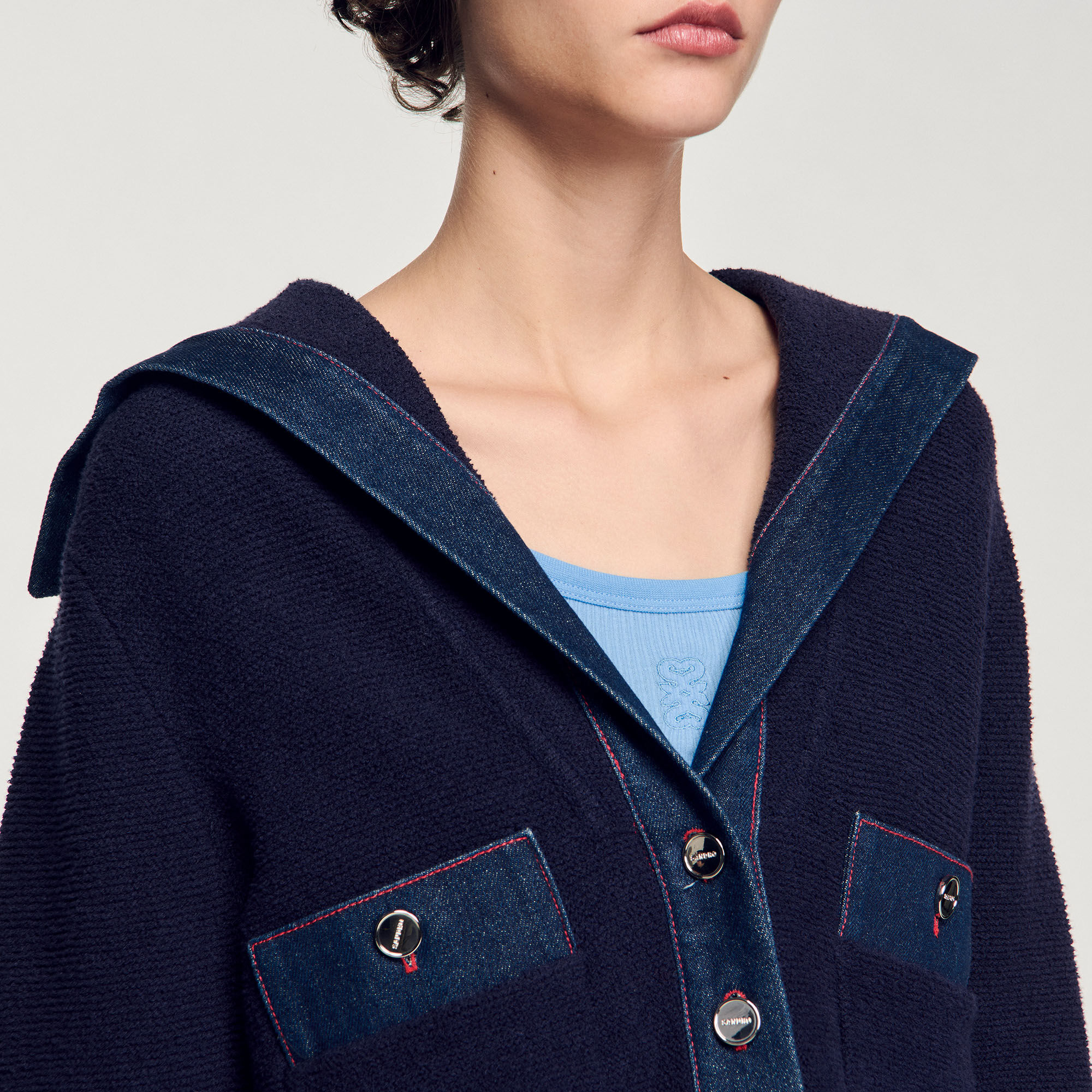 Cárdigan con detalles denim