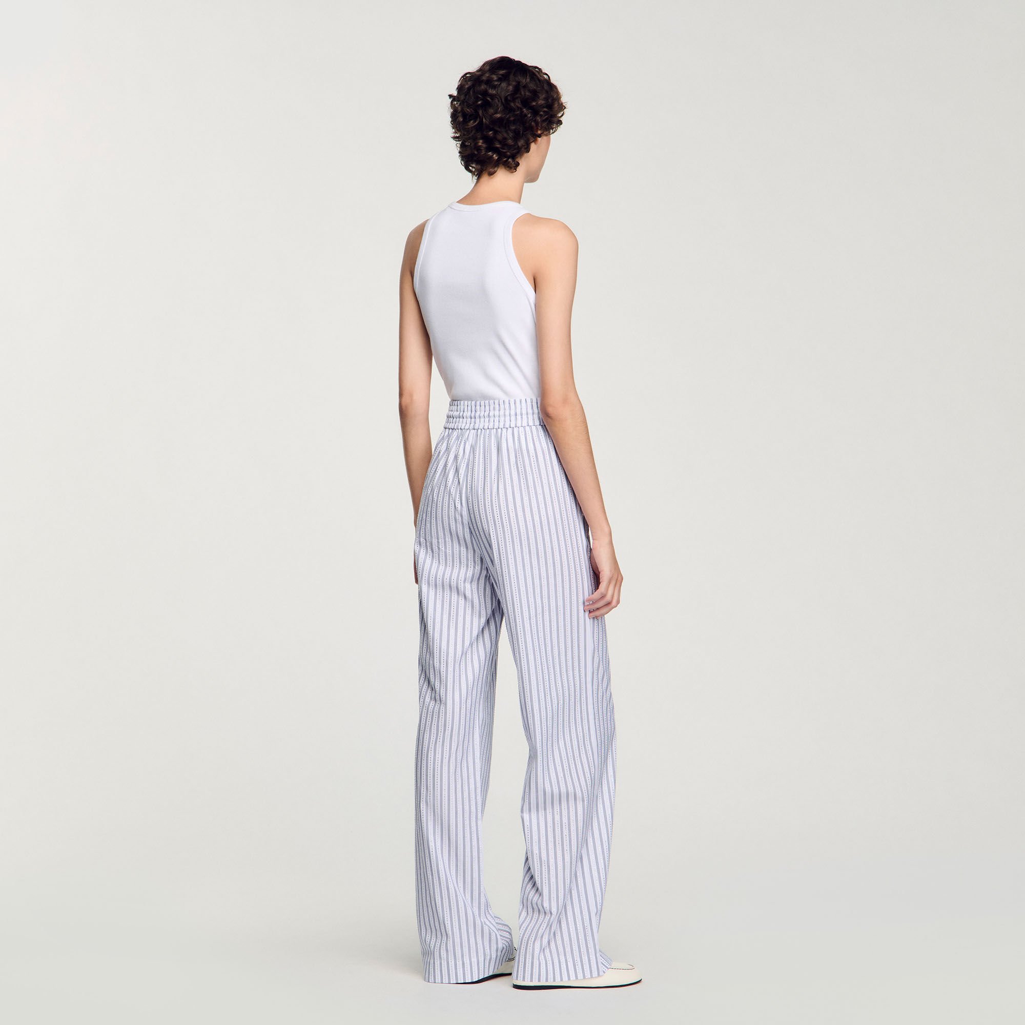 Pantalón a rayas con brillantes