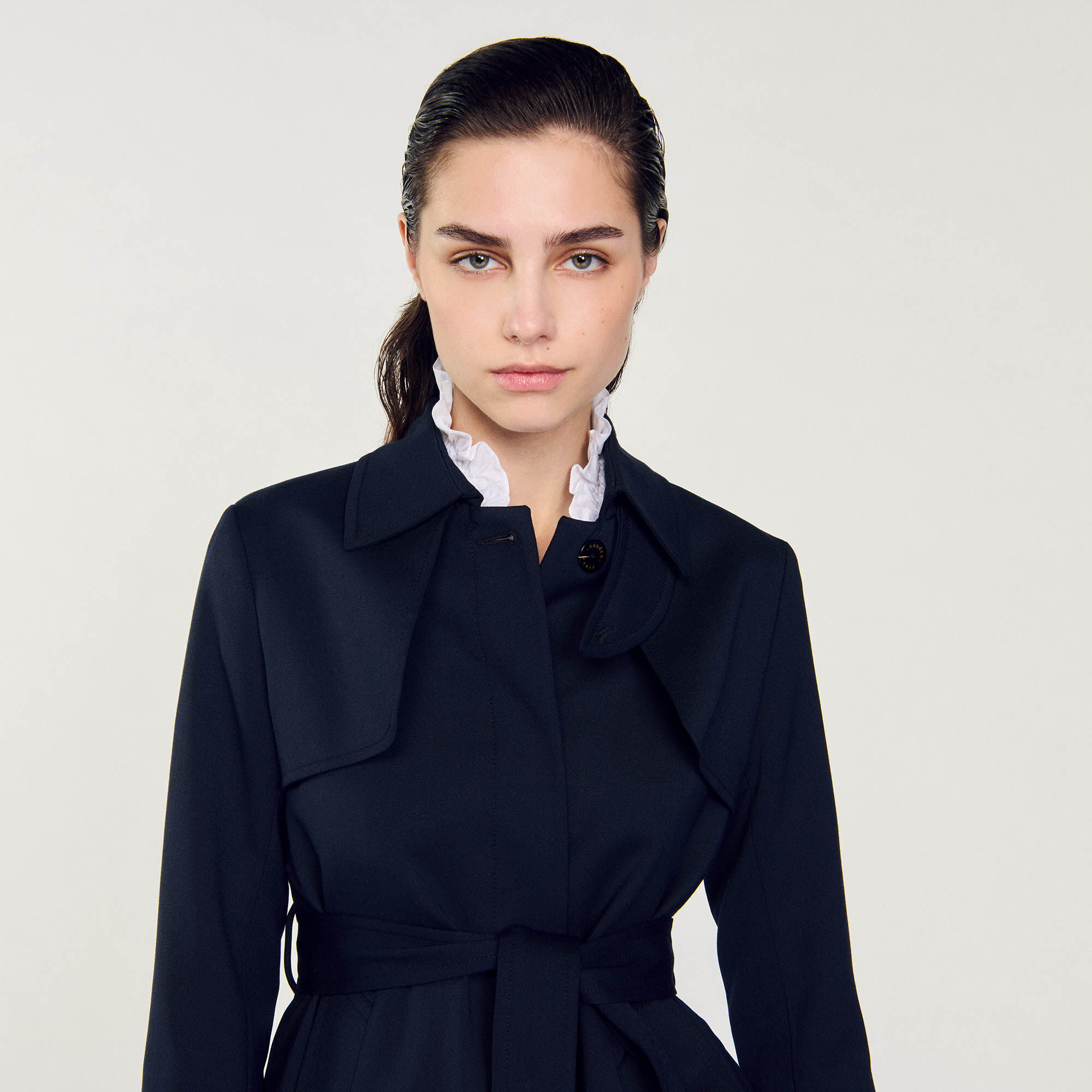 Gabardina con inserto plisado