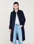 Gabardina con inserto plisado