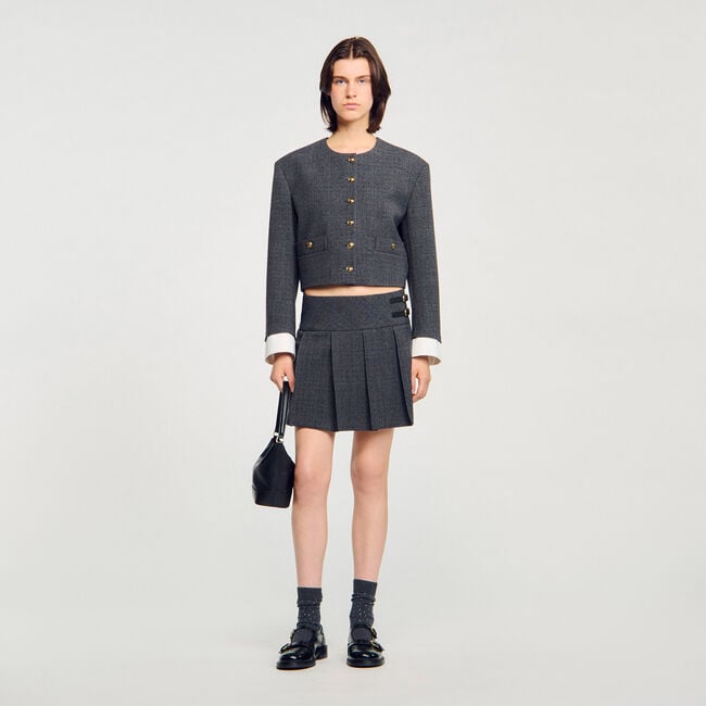 Falda corta de traje con strass