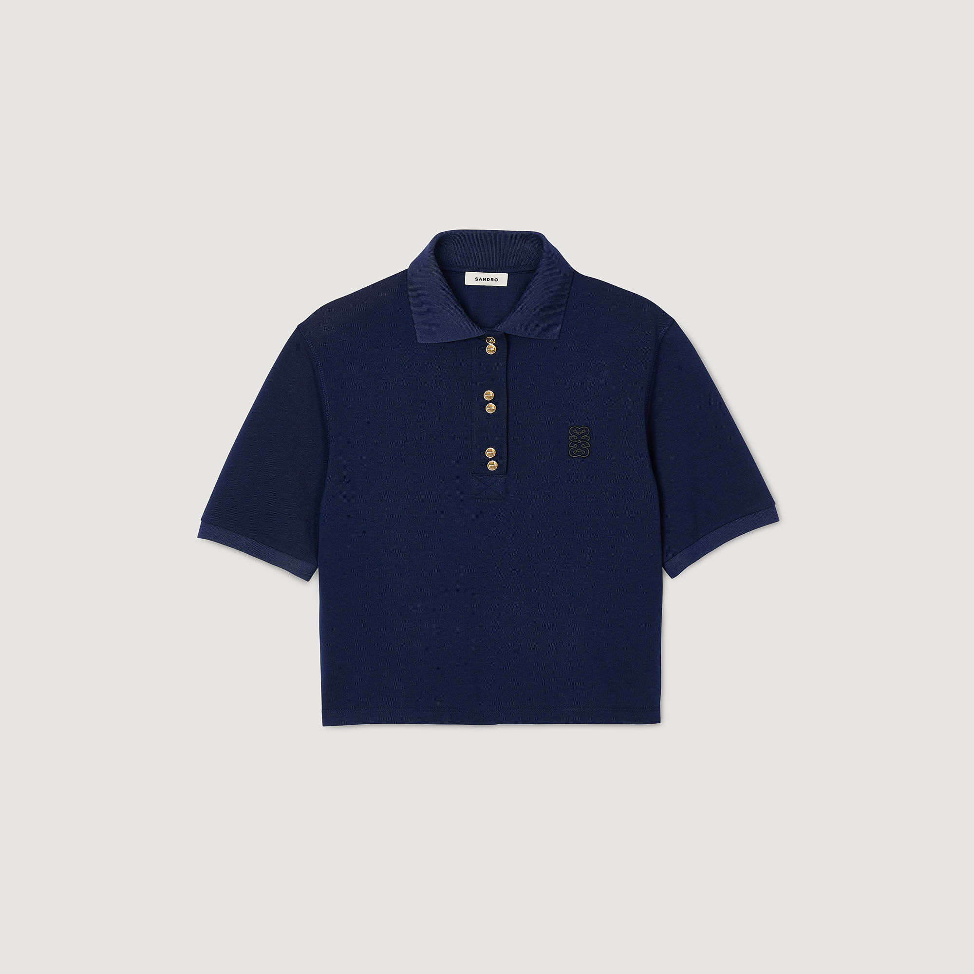 Polo con botones de fantasía