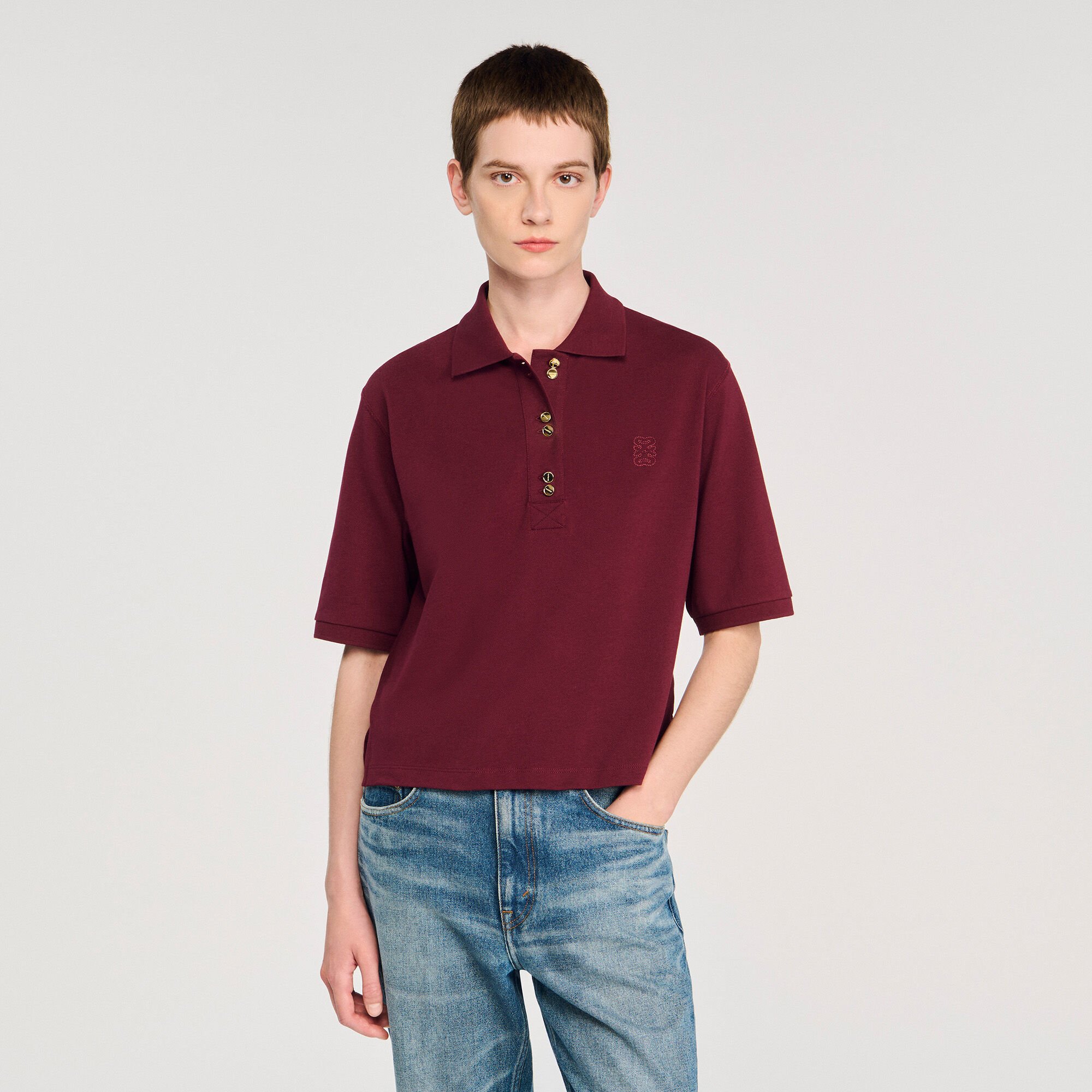 Polo con botones de fantasía