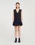 Vestido corto de sastre con volante