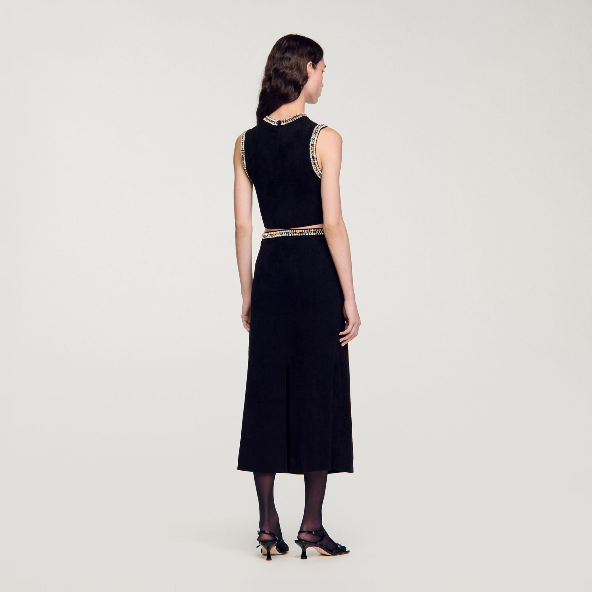 Top de punto con cuello joya