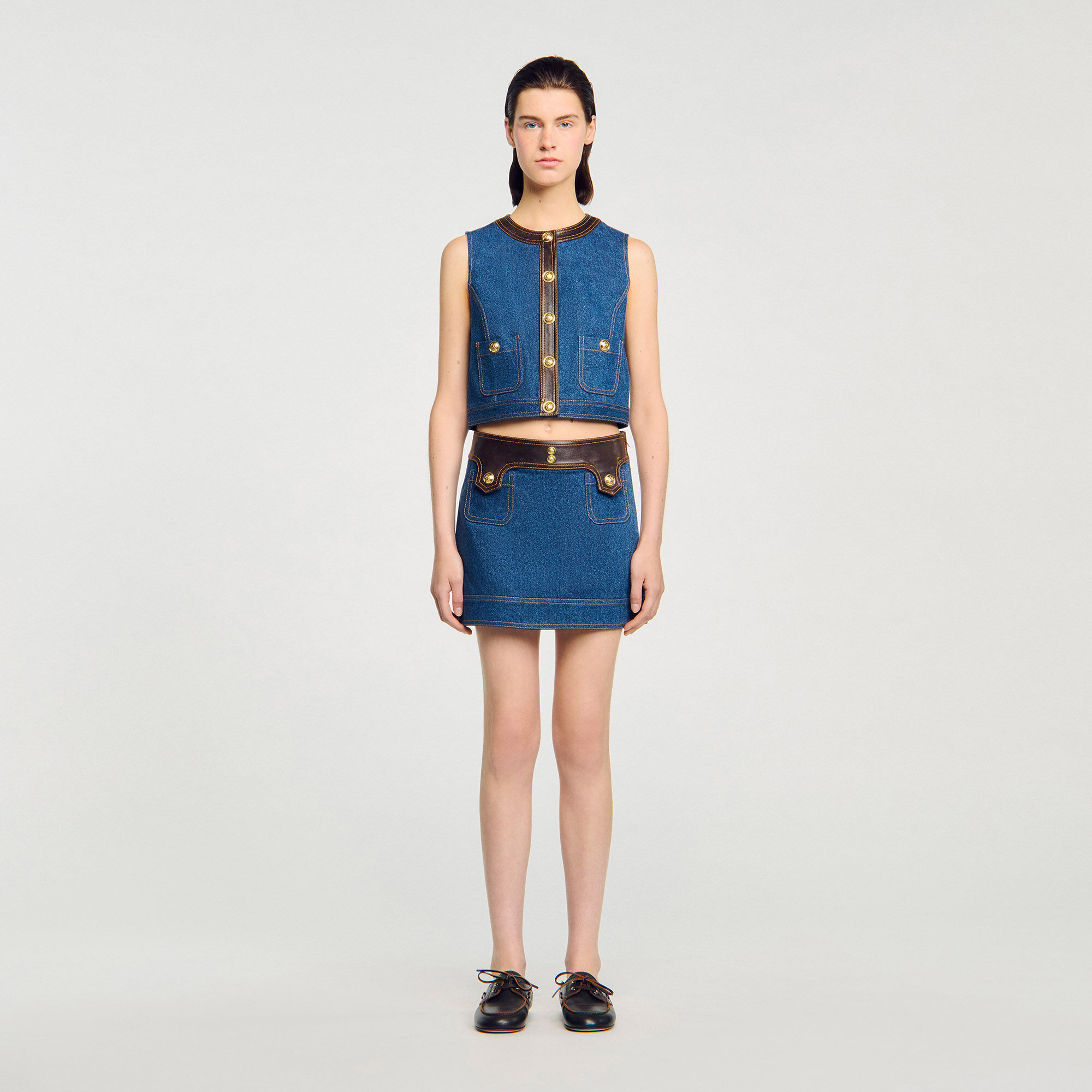 Top de denim y cuero