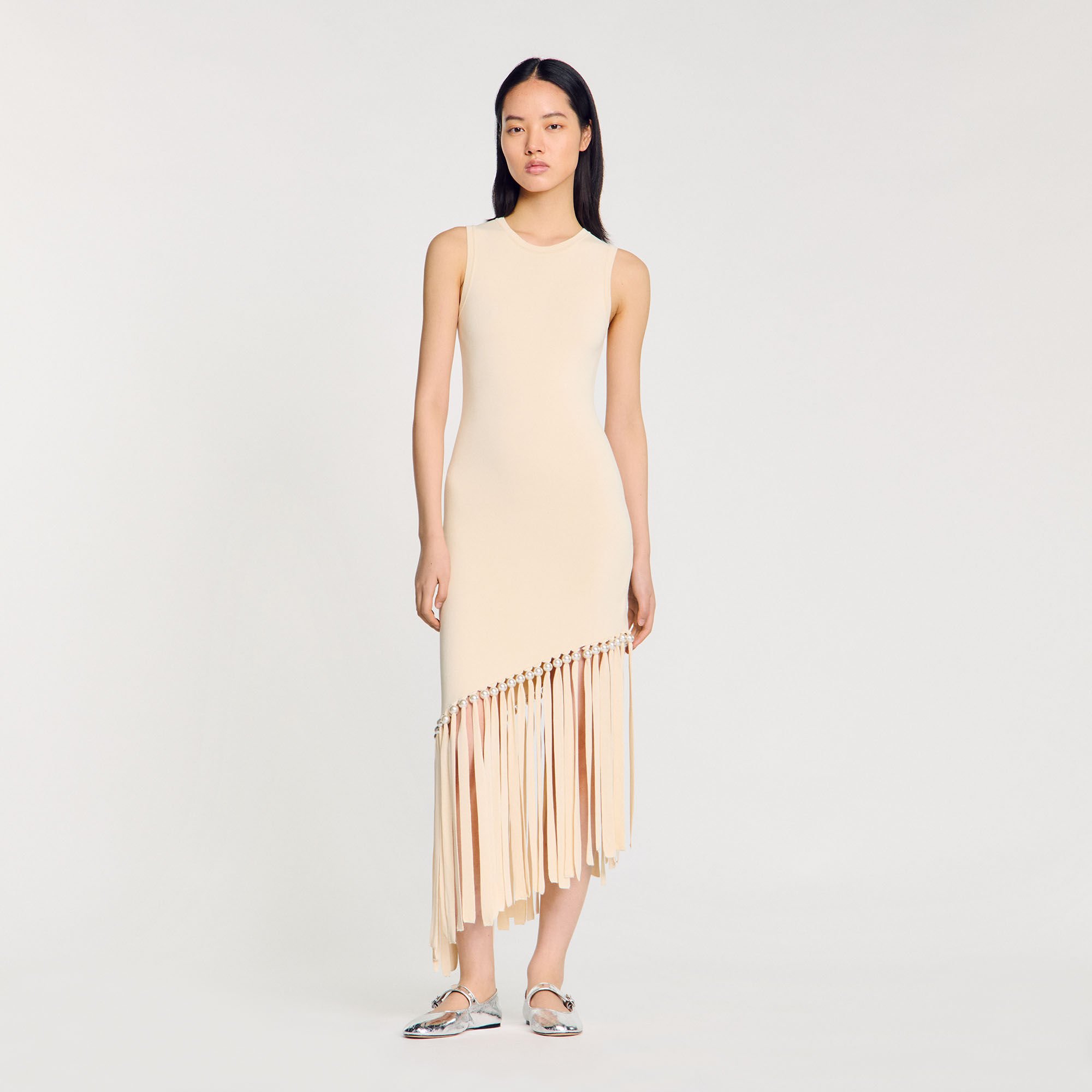 Vestido de punto con flecos y perla