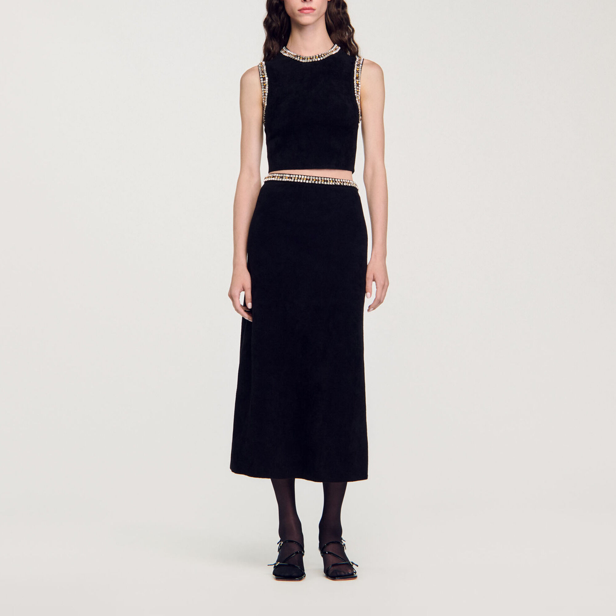 Top de punto con cuello joya