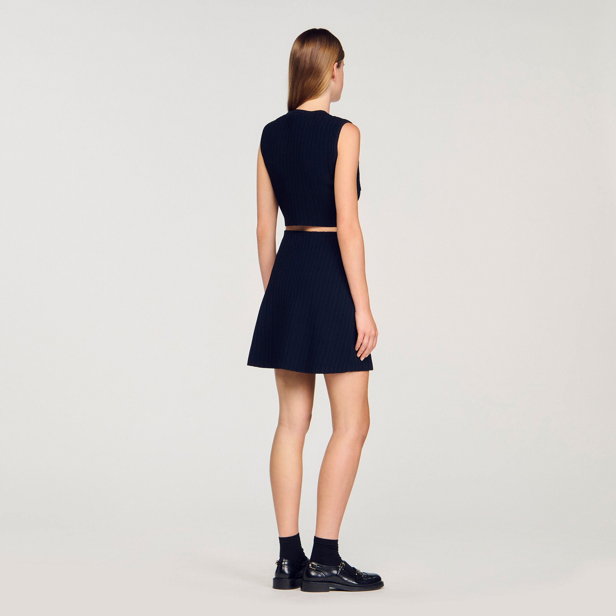 Top de punto y denim
