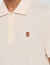 Polo con logotipo de cuero