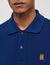 Polo con logotipo de cuero