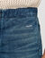 Pantalón corto de denim elástico
