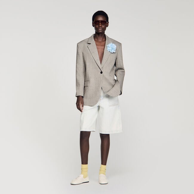 Chaqueta de lana a cuadros y broche