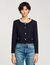 Chaqueta con cuello de pedrería
