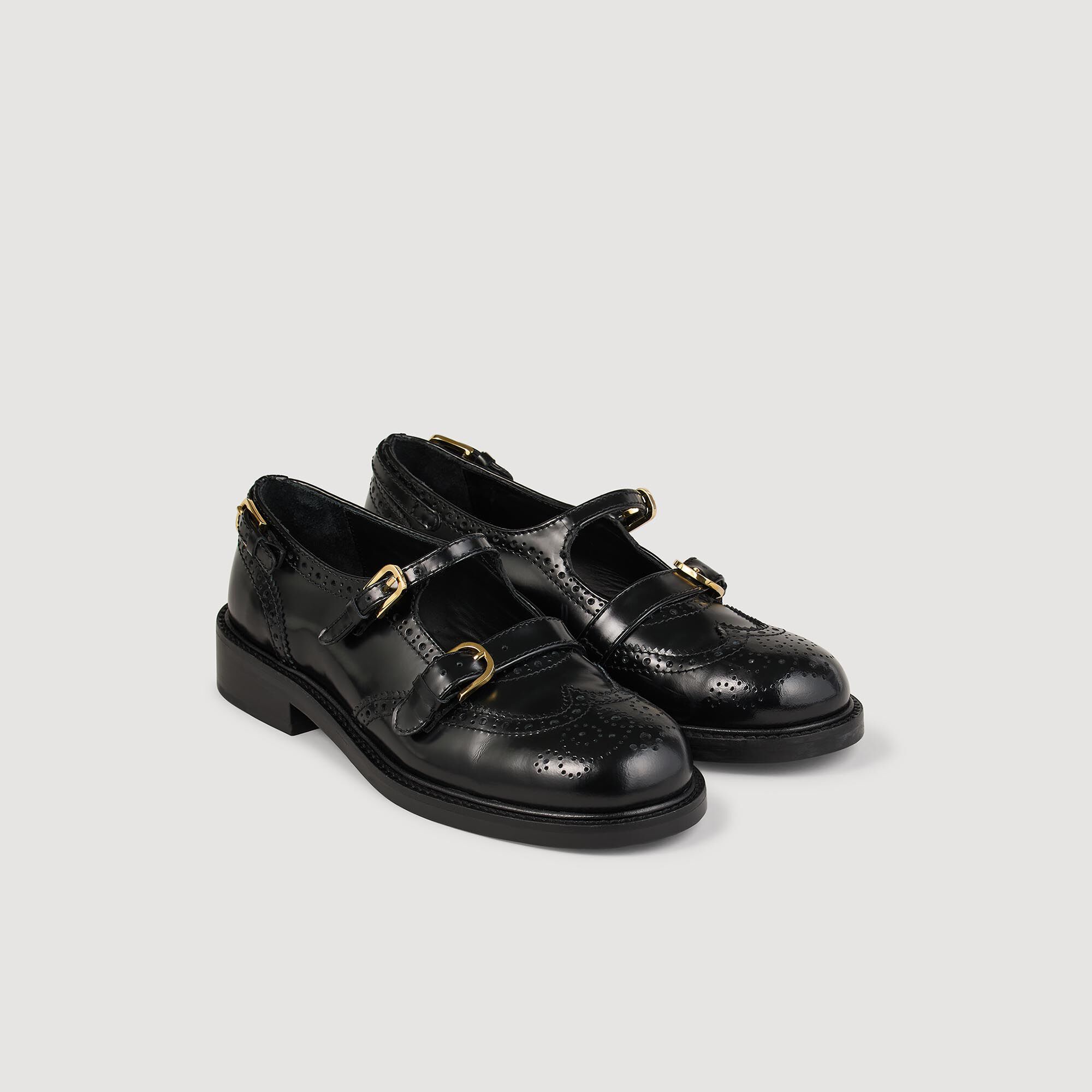 Zapatos derby abiertos con hebillas