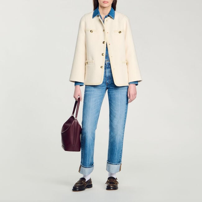 Abrigo con ribetes trenzados