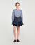 Falda corta de denim con volantes