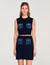 Top de punto y denim