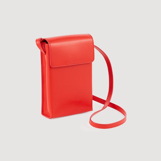 Pochette con bandolera de piel lisa