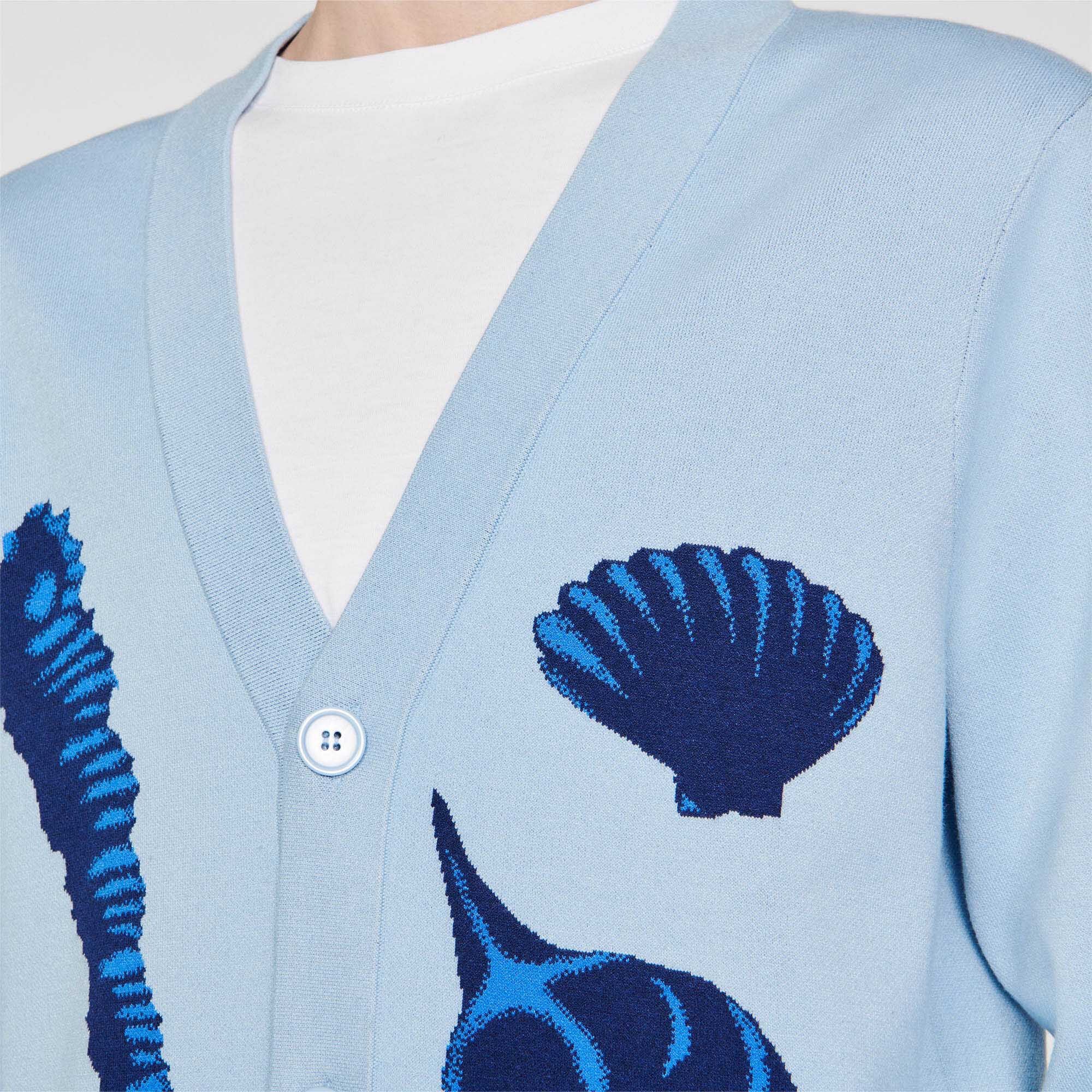 Cárdigan de punto con conchas jacquard