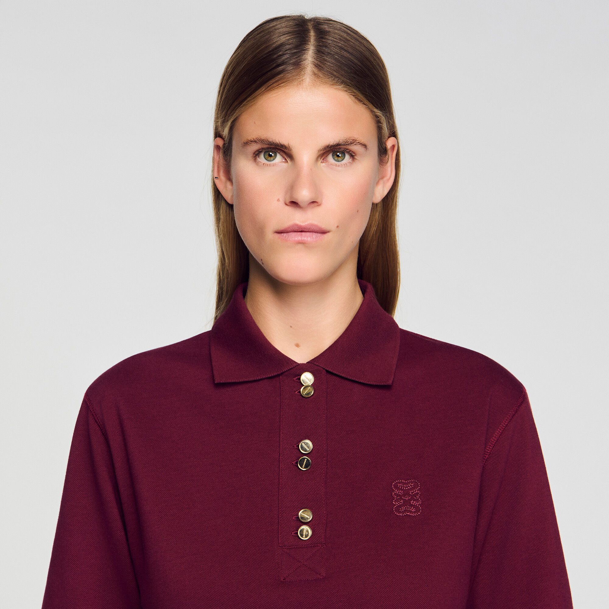 Polo con botones de fantasía
