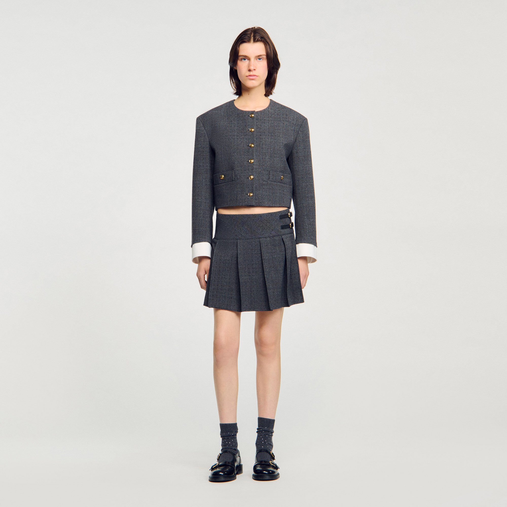 Falda corta de traje con strass