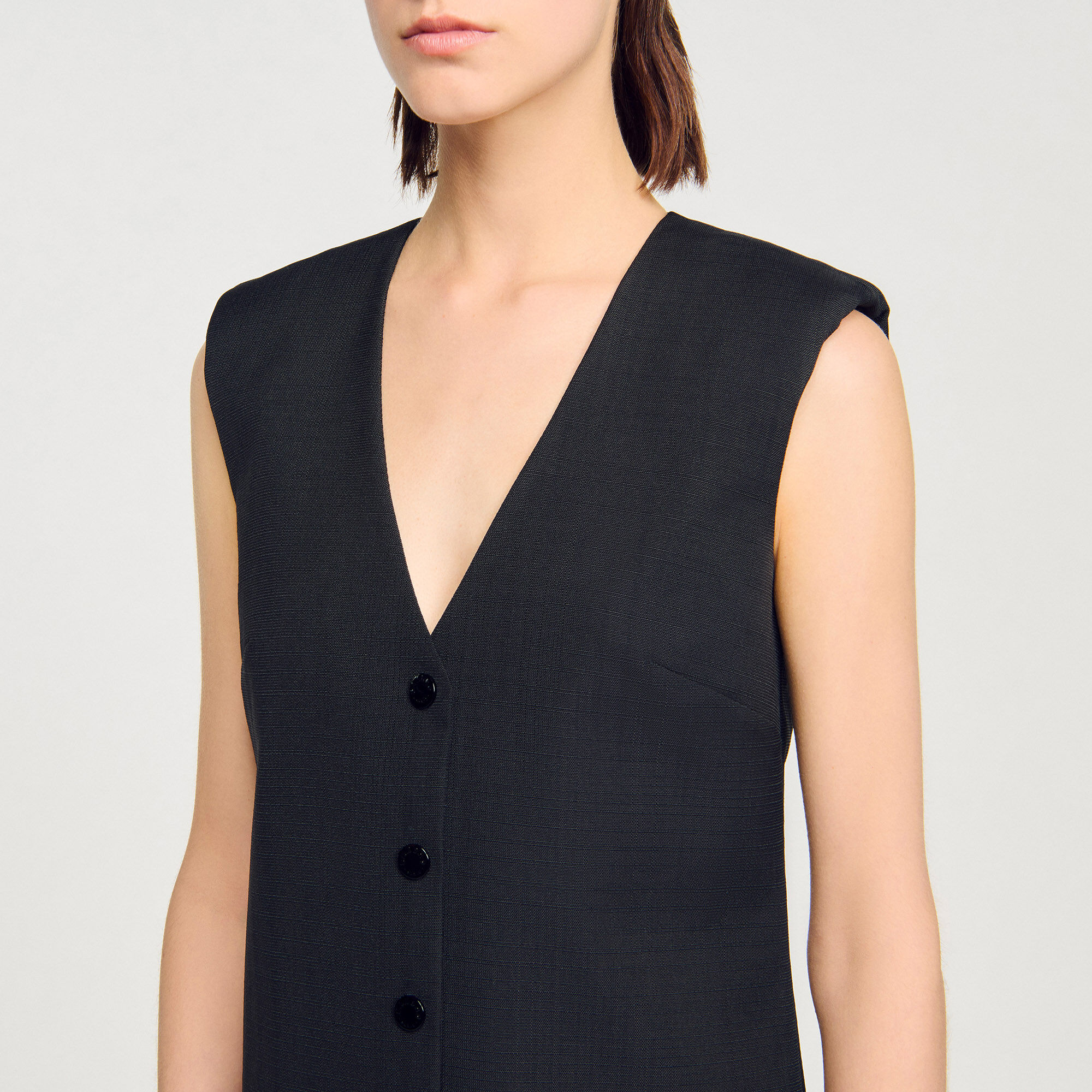 Vestido corto de sastre con volante