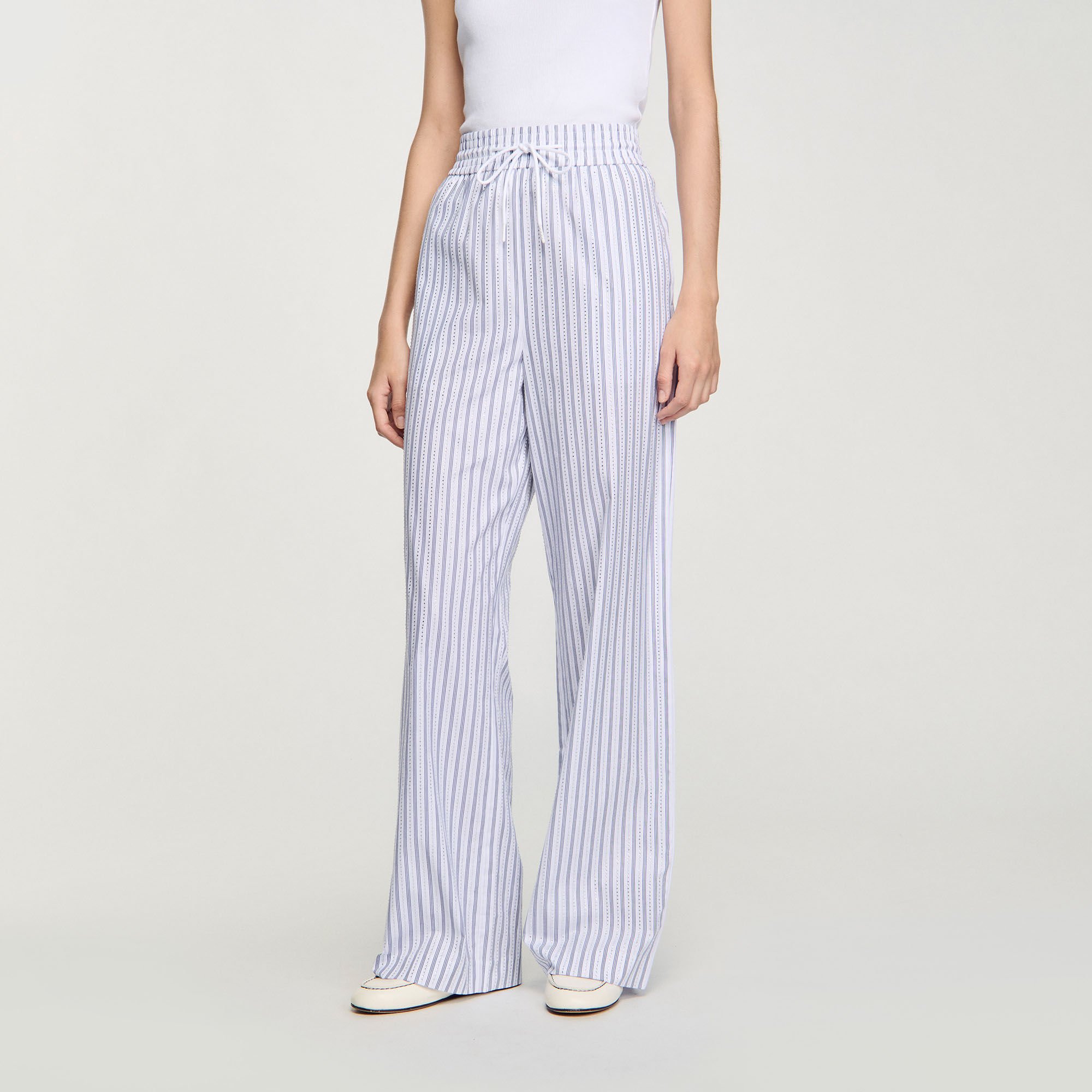 Pantalón a rayas con brillantes