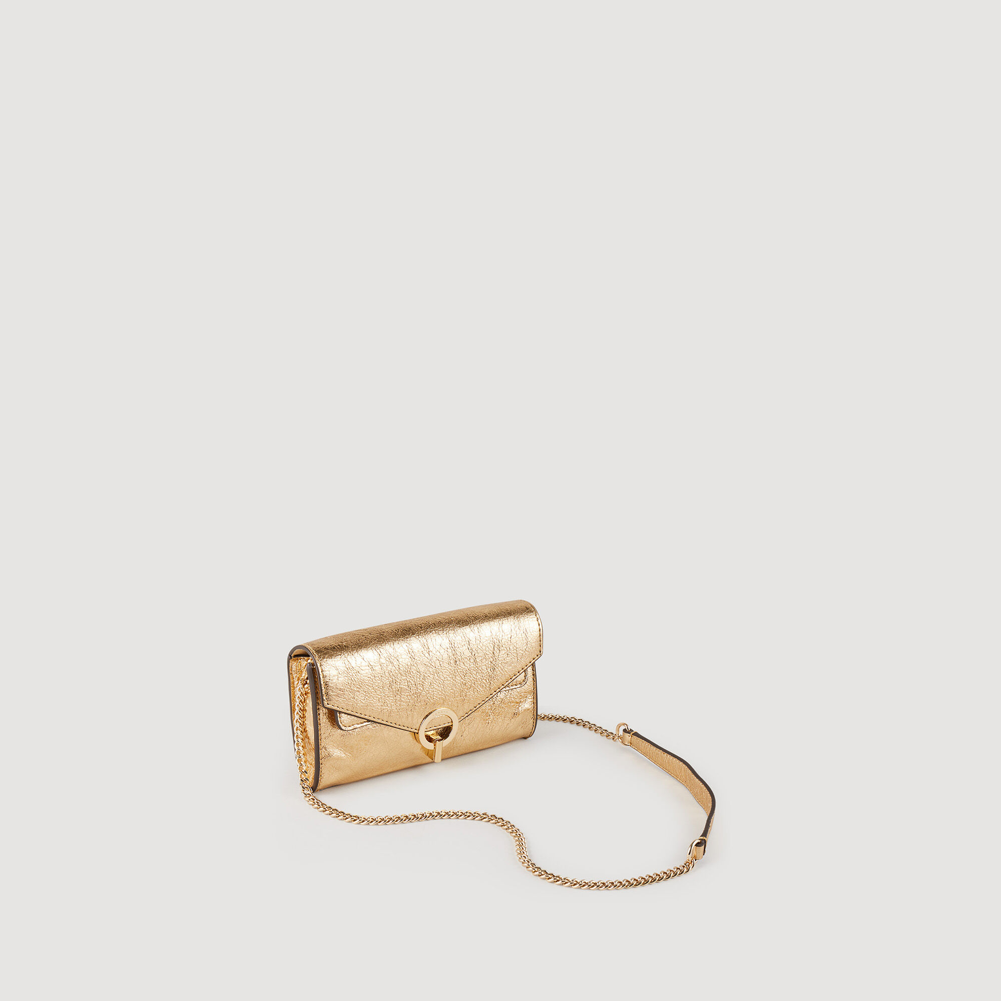 Bolso pochette de piel dorada