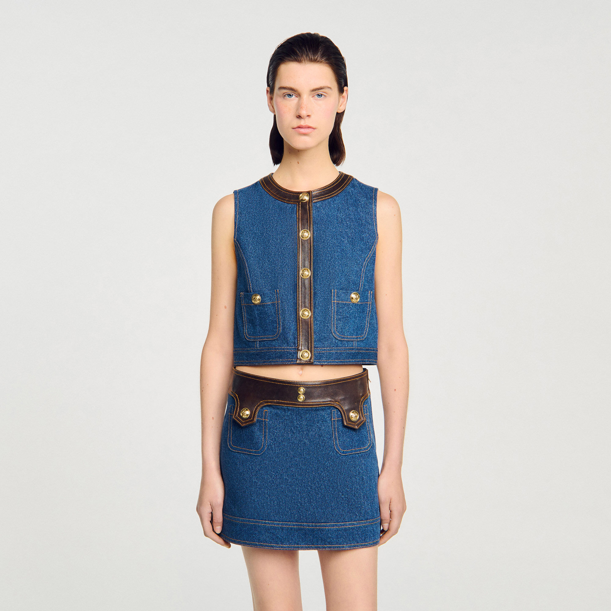 Top de denim y cuero