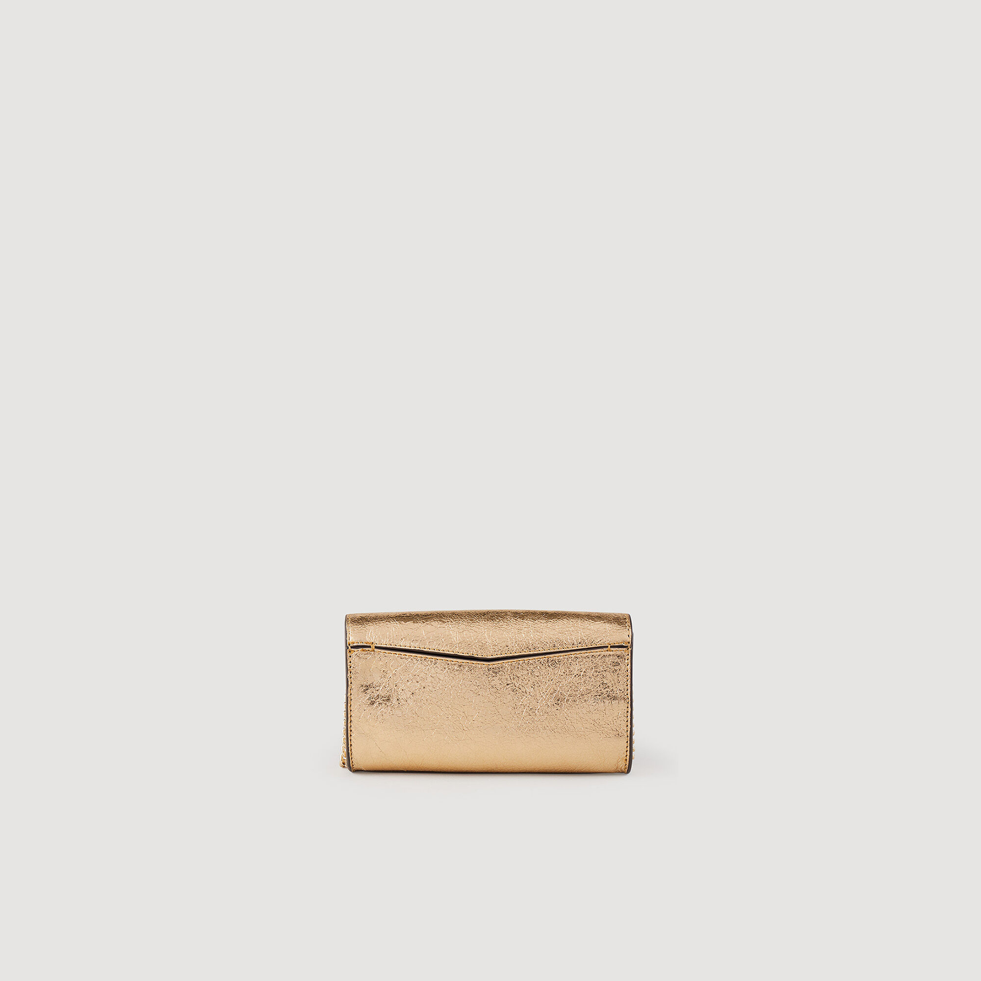Bolso pochette de piel dorada