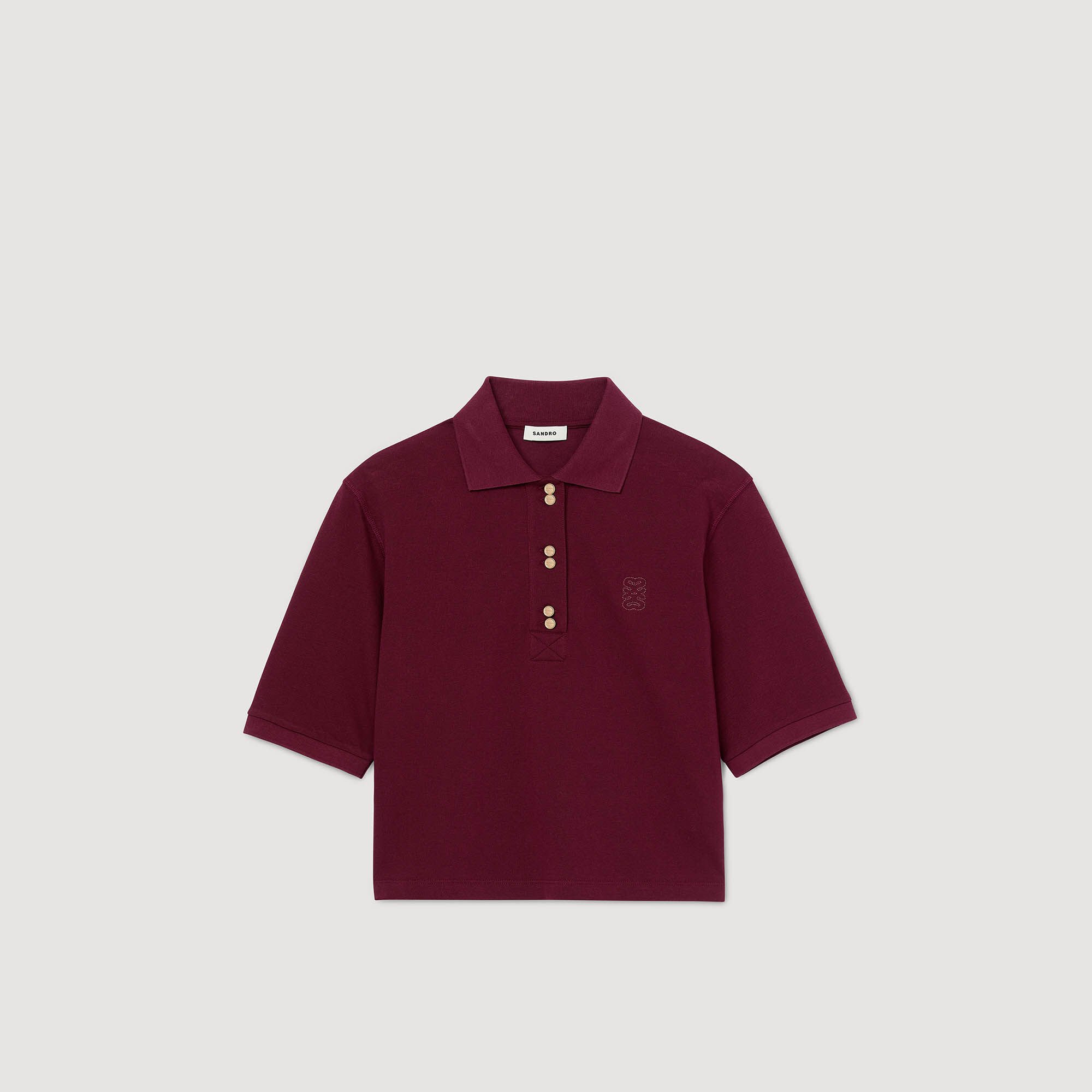 Polo con botones de fantasía