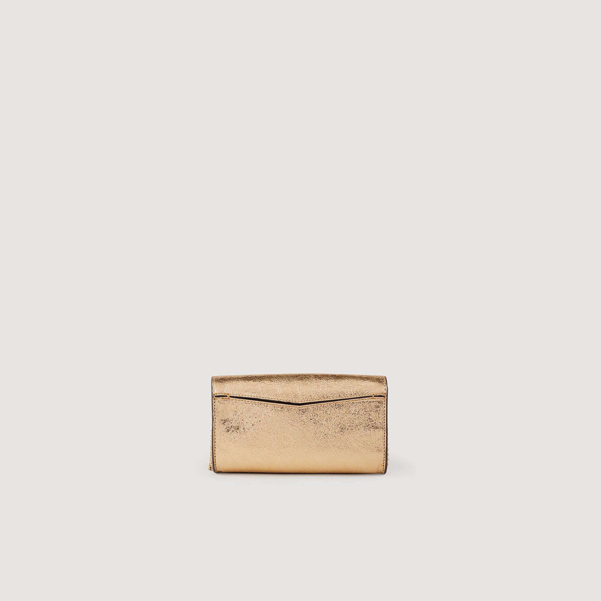 Bolso pochette de piel dorada