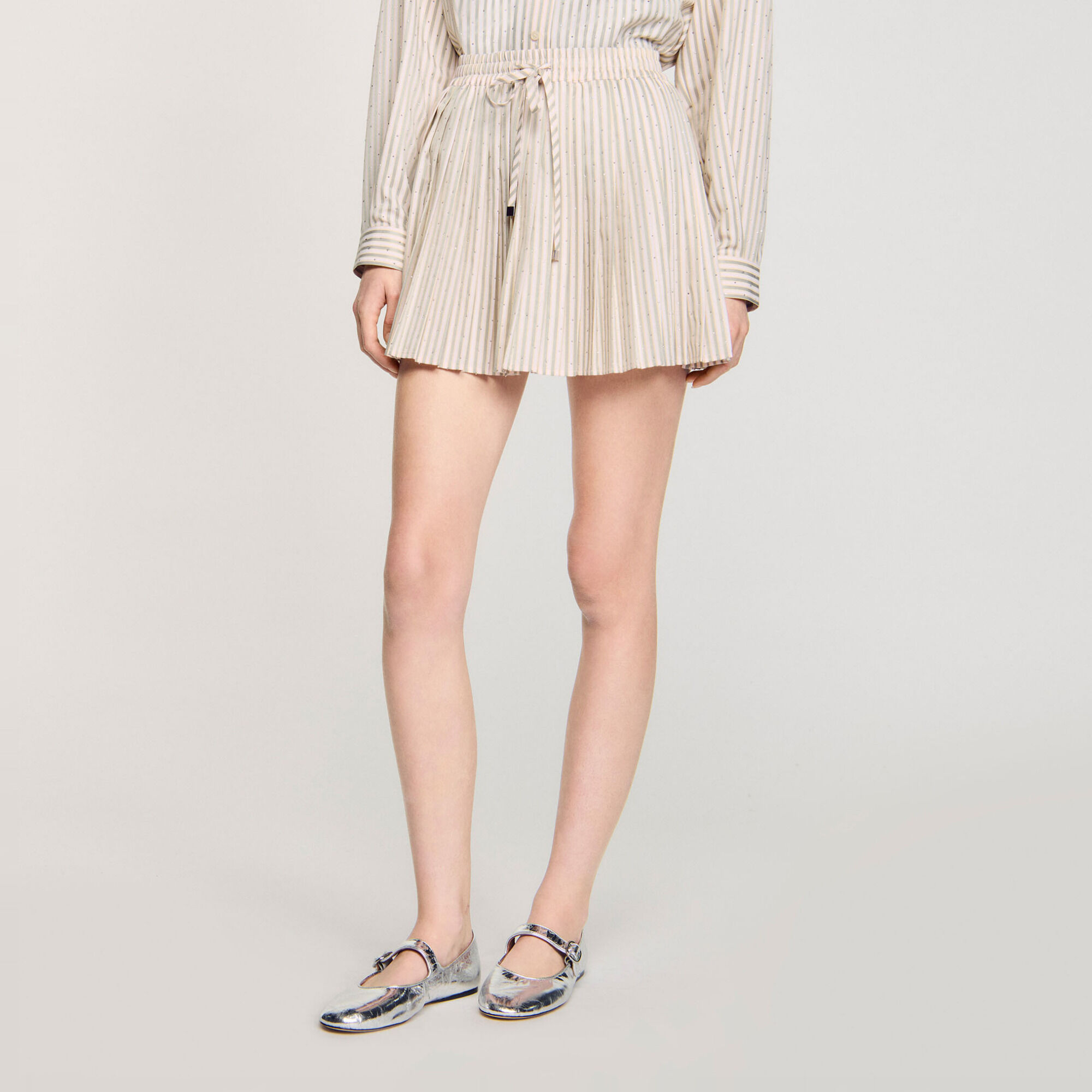 Falda de rayas plisada con strass